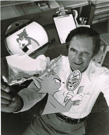 Joseph Roland Barbera holds aloft and gleefully glances at a transparent inlay of Tom & Jerry!
